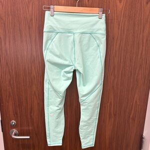 Fabletics PowerHold Leggings in Mint Green. Small